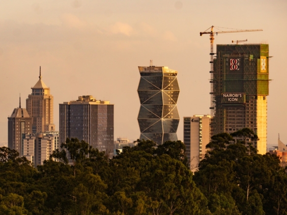 a view of a city with tall buildings in the background