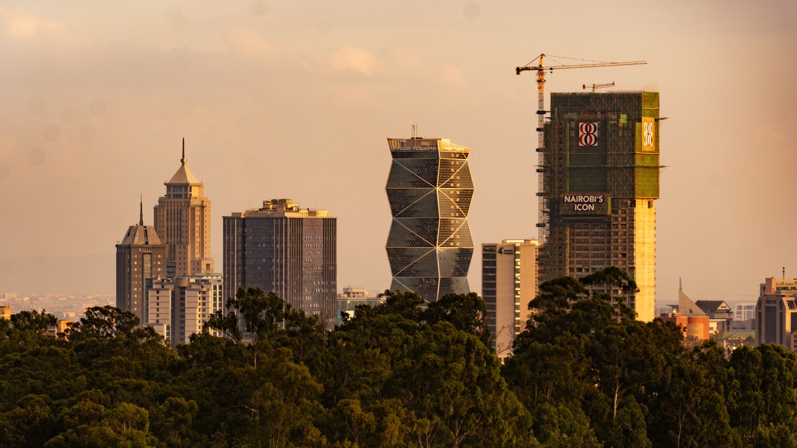 a view of a city with tall buildings in the background