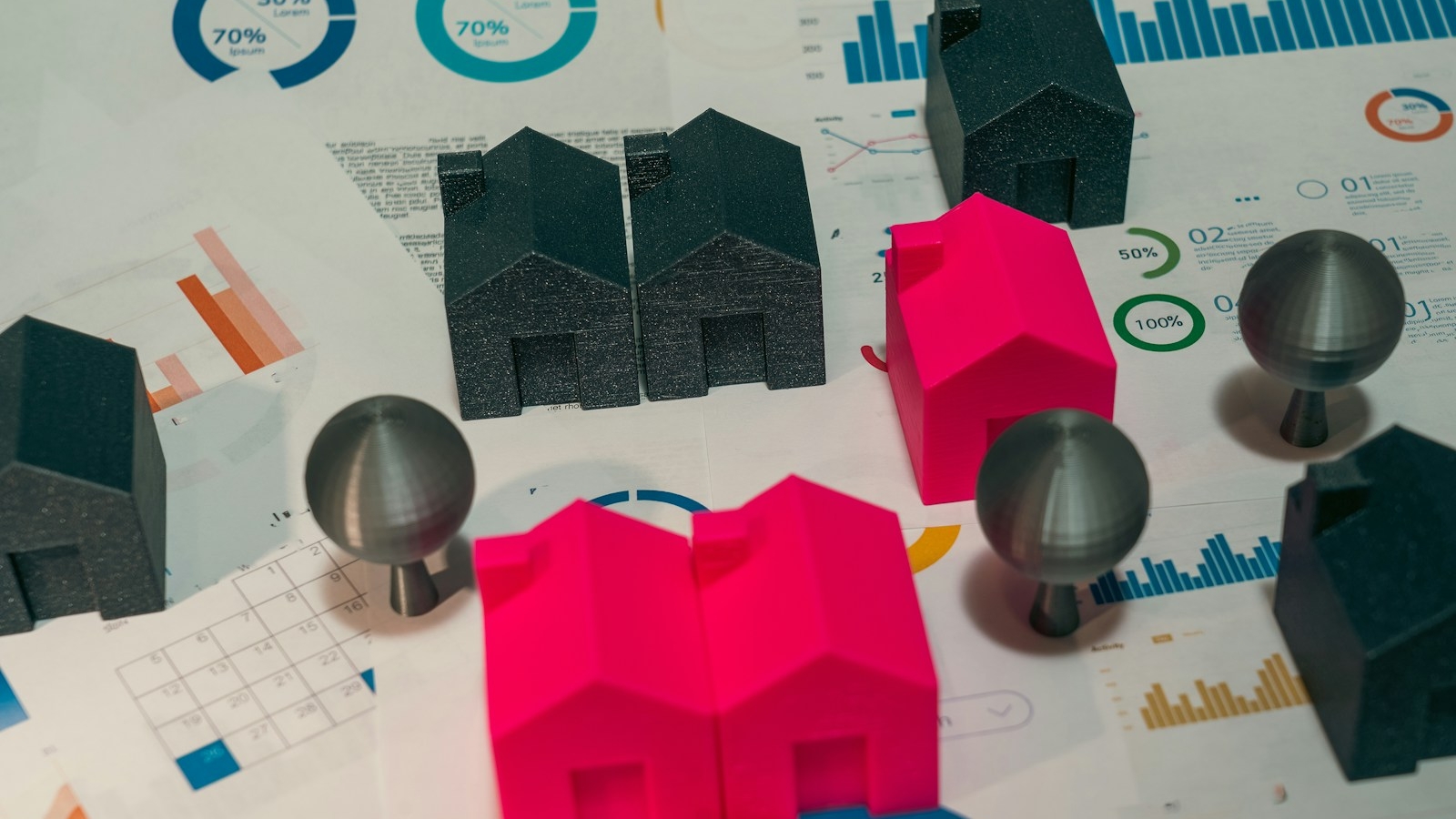 Monopoly houses and financial charts