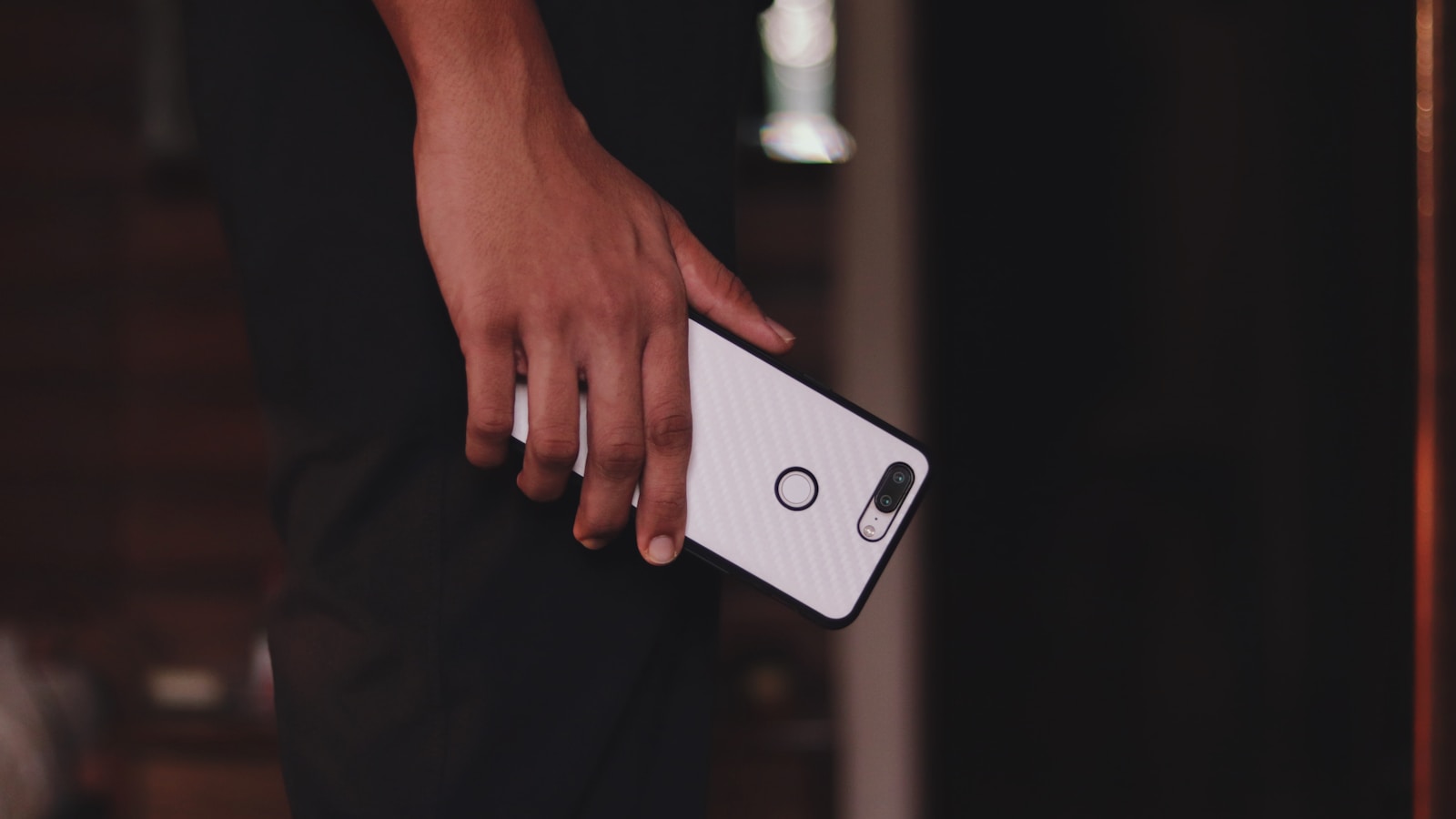 person holding silver iphone