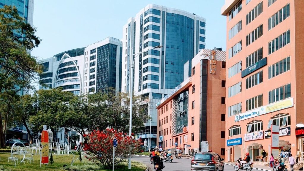Vibrant cityscape of Kigali showcasing modern high-rise buildings on a sunny day.